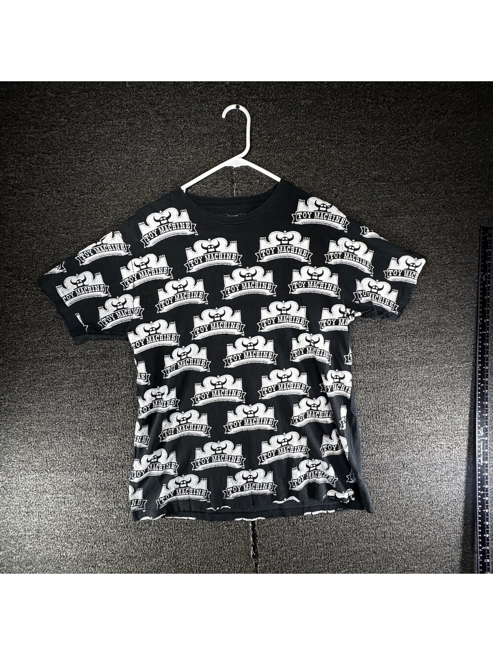 Toy Machine Skateboards All-Over Logo Print T-Shirt (Black, Size Large)
